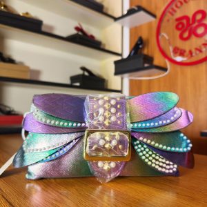 Luxury butterfly clutch pause